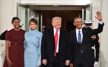 US President Barack Obama(R) and First Lady Michelle Obama(L) welcome Preisdent-elect Do<em></em>nald Trump(2nd-R) and his wife Melania to the White House in Washington, DC January 20, 2017