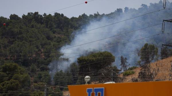 Smoke rises above northern Israel, after Hezbollah claimed it launched more than 200 rockets targeting Israeli military positions in northern Israel July 4, 2024. REUTERS/Ro<em></em>nen Zvulun