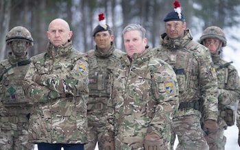 Sir Keir (centre right) visited the Tapa NATO forward operating ba<em></em>se in Esto<em></em>nia with John Healey (centre left) to meet soldiers deployed with the British Armed Forces