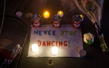 Candles light up the tributes left at the site wher<em></em>e a vigil was held in support of the families involved in stabbing