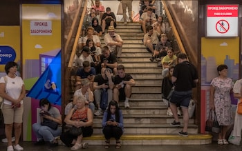 People take shelter in the Teatralna metro station