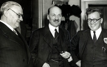 Clement Attlee, centre, at Central Hall, Westminster, with Ernest Bevin, left, and Herbert Morrison, right, wher<em></em>e celebrations are taking place as Labour win the General Election in July 1945