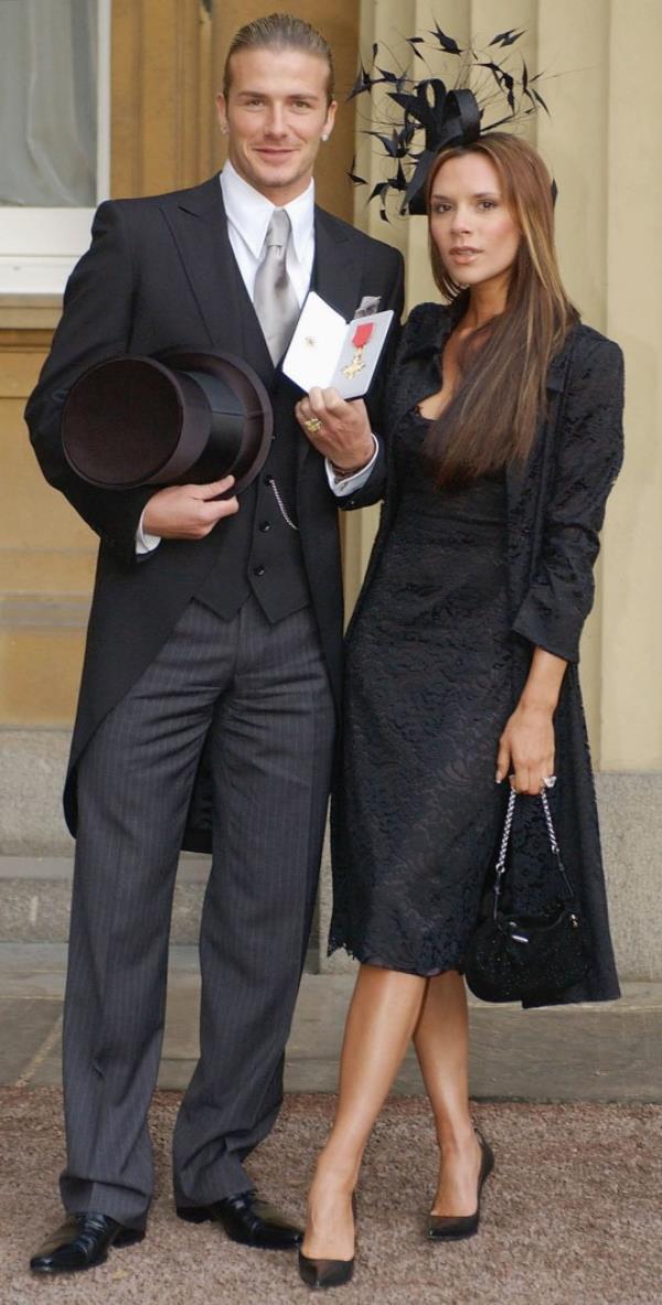 Lo<em></em>nDON - NOVEMBER 27: (FILE PHOTO) England football captain David Beckham stands with his wife Victoria, as he shows off the OBE (Officer of the Order of the British Empire) he received from Britain's Queen Elizabeth II at Buckingham Palace on November 27, 2003 in London. David Beckham and former PA Rebecca Loos are under scrutiny for an alleged affair, reported by the News Of The World this weekend. (Photo by ROTA/Getty Images)