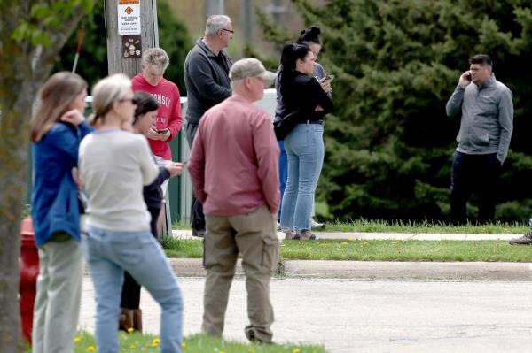 Bystanders observing law enforcement respo<em></em>nding to an active shooter threat at Mount Horeb Middle School, Wisconsin