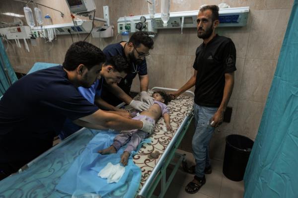 A Palestinian child receives medical treatment at al-Aqsa hospital in the Gaza Strip on Oct. 15.