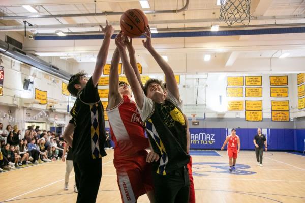 players shooting hoops