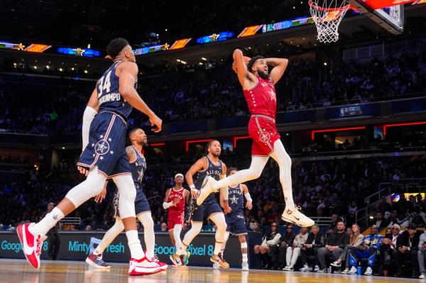 Karl-Anthony Towns goes up for two of his 50 points in Sunday's NBA All-Star Game. 