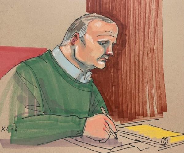 Defendant Robert Bowers takes notes during a sentencing hearing that will determine if he gets a life sentence or the death penalty, in Pittsburgh federal court on Monday, July 31, 2023. Jurors are expected to begin deliberations early Tuesday in the 2018 attack that killed 11 worshippers. (Dave Klug via AP)