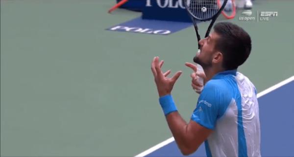 Djokovic angrily turned toward the crowd after he lost the point.