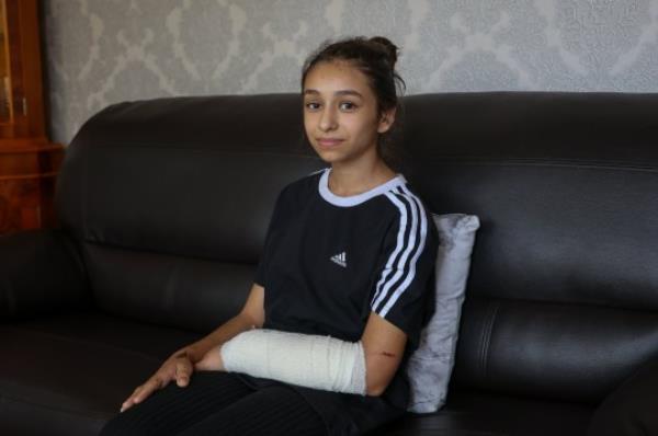 Schoolgirl Ana Paun, 11, suffered arm and shoulder injuries when the dog went for her (Picture: SWNS)