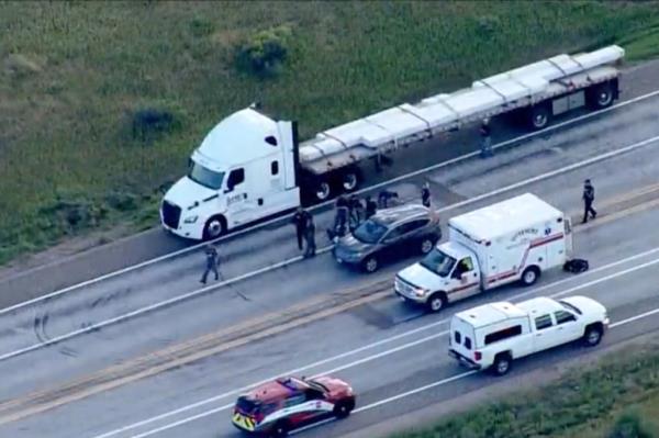 The scene of the accident, including an ambulance.