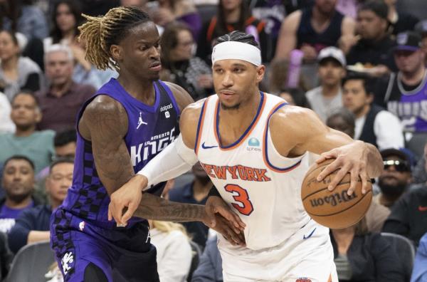 Josh Hart, who had nine points and 13 rebounds, drives on Keon Ellis during the Knicks' win.