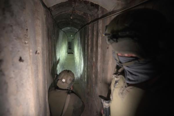 Israeli soldiers search the weapons-filled Hamas tunnels reportedly found beneath the Al-Shifra hospital in Gaza