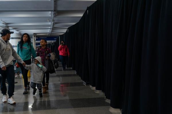 A curtain separating the asylum seekers from the rest of the airport.