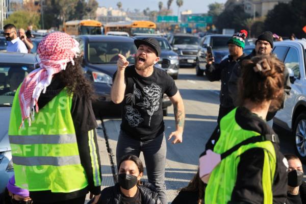 A driver screaming at a protester. 