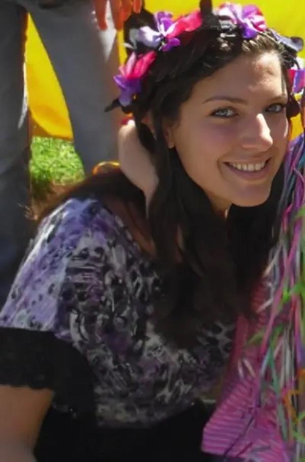 A photo of Sawicki wearing a crown of flowers