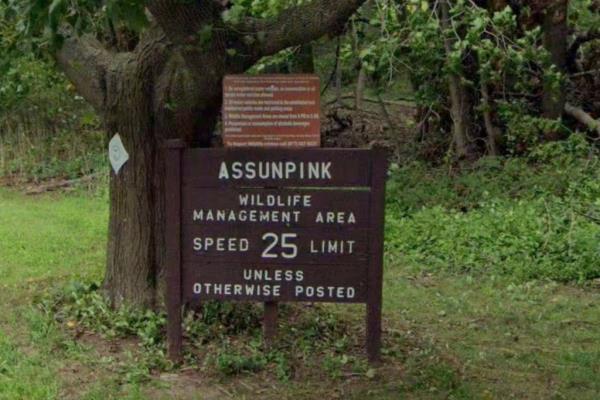 A photo of a sign of the Assunpink Wildlife Management Area