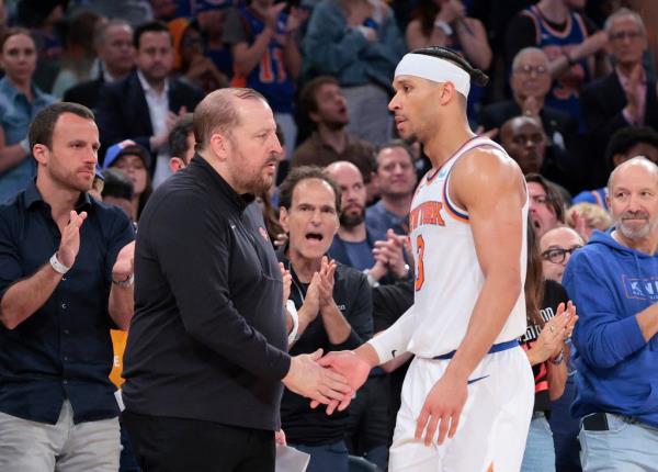 Knicks coach Tom Thibodeau greets Josh Hart as he walks back to the bench after a standing ovation from fans on May 19, 2024.