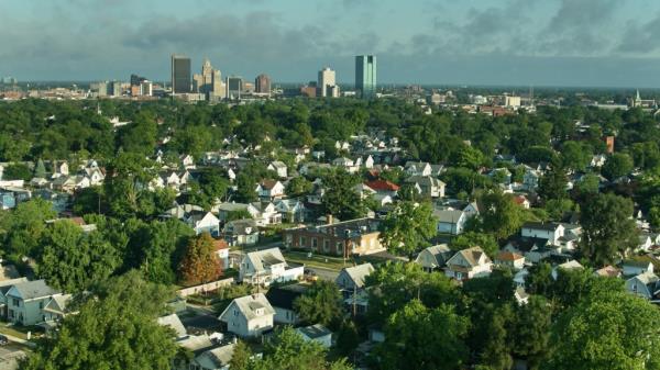 Aerial shot of Toledo, Ohio on a summer morning, looking across single family homes.