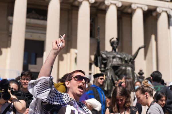 Protesters joined Columbia's faculty as they cheered to protect student's academic freedom.