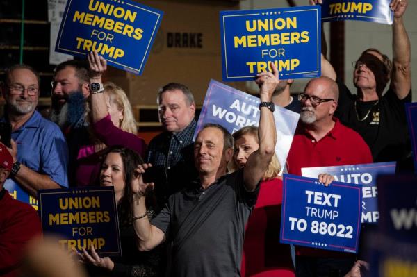 Supporters cheer as former President Do<em></em>nald Trump speaks at Drake Enterprise in Clinton Township on Wednesday, Sept. 27, 2023.