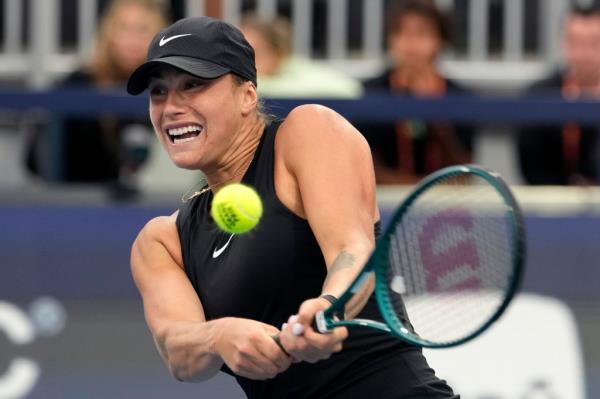 Aryna Sabalenka greets Paula Badosa of Spain at the net after defeating her on day 7 of the Miami Open at Hard Rock Stadium on March 22, 2024 in Miami Gardens, Florida. 