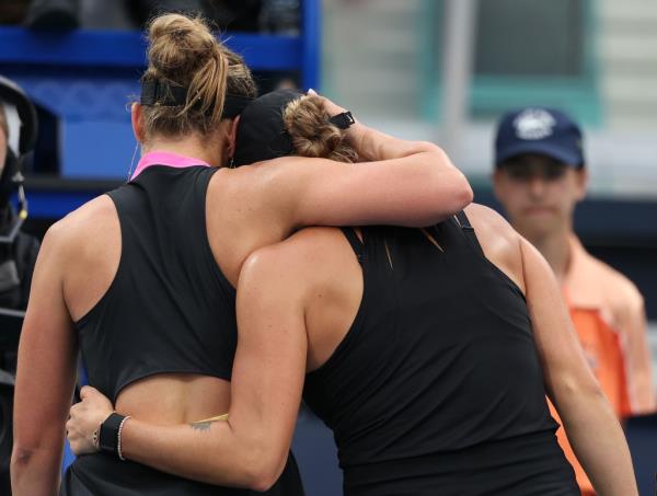 Aryna Sabalenka greets Paula Badosa of Spain at the net after defeating her on day 7 of the Miami Open at Hard Rock Stadium on March 22, 2024 in Miami Gardens, Florida.