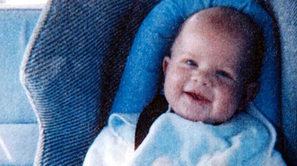 Folbigg's second child, Patrick, smiles for the camera before his death at eight mo<em></em>nths old.