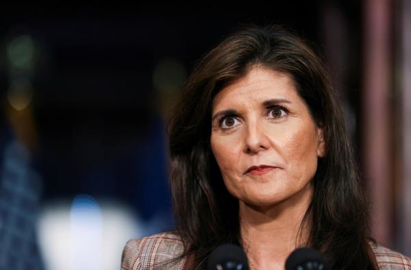 Republican U.S. presidential candidate and former U.S. Ambassador to the United Nations Nikki Haley looks on, as she registers for the South Carolina 2024 presidential primary ballot at the South Carolina State House in Columbia, South Carolina.