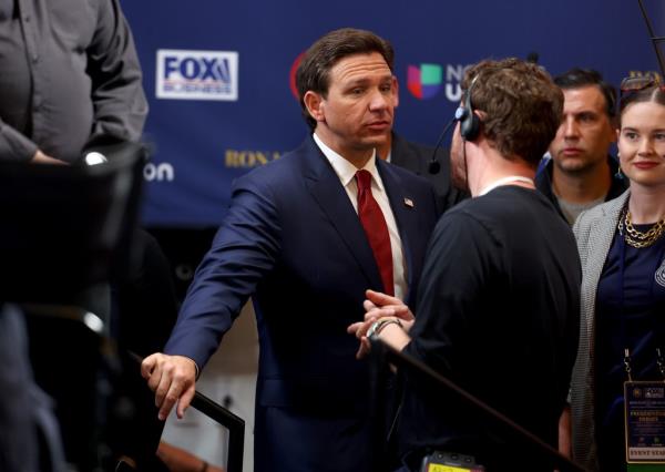 Republican presidential candidate Florida Gov. Ron DeSantis prepares to talk to reporters in the spin room at the FOX Business Republican Primary Debate at the Ro<em></em>nald Reagan Presidential Library on September 27, 2023 in Simi Valley, California.