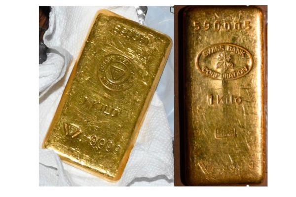 Two gold bars marked on left, 1 KILO and on right Swiss Bank Corporation 1 kilo