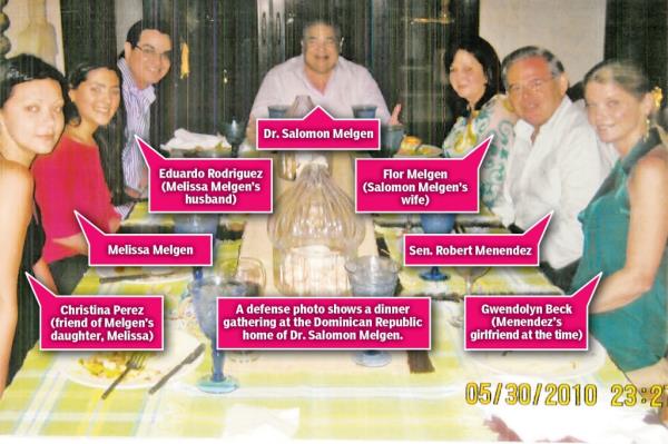 A group around a table with arrows pointing to them. Clockwise from left: Christina Perez (friend of Melgen's daughter, Melissa); Melissa Melgen; Eduardo Rodriguez (Melissa Melgen's husband); Dr. Salomon Melgen; Flor Melgen (Salomon Melgen's wife); Sen. Robert Menendez; Gwendolyn Beck (Menendez's girlfriend at the time). Photo is watermarked 05/30/2010 23:27