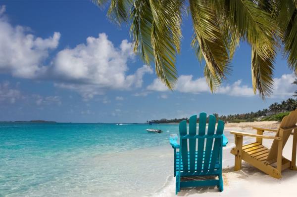 A beach chair on a beach. 