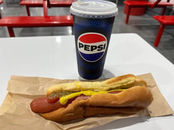 This is a close-up of the quarter-pound all-beef hot dog and 20-ounce soft drink combo at the new Costco at One Daytona purchased on the morning of the Daytona Beach store's opening day, Thursday, Feb. 22, 2024. The price for the combo was $1.50, unchanged from when the retail giant began offering it in 1985.</p>

<p>　　