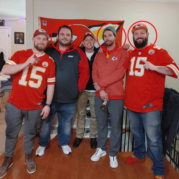 David Harrington (second left), Clayton McGeeney (second right) and Ricky Johnson (right) are shown with two unidentified fellow Chiefs fans.