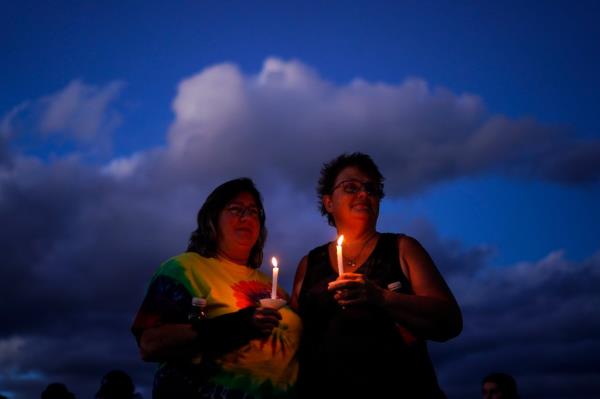 People with candles.