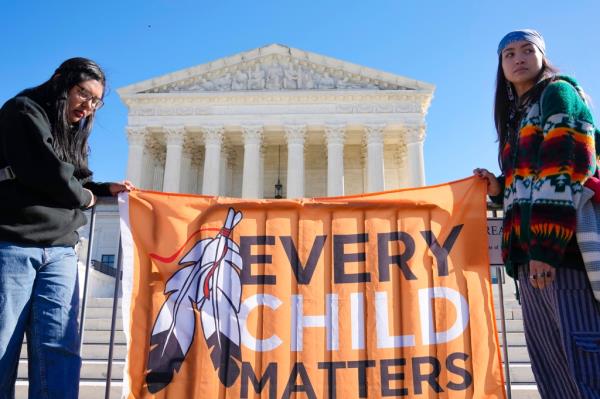 Tribal members demo<em></em>nstrate outside the Supreme Court.