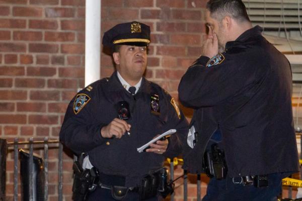 Police at the scene of the fatal shooting at NYCHA's St. Nicholas Houses.