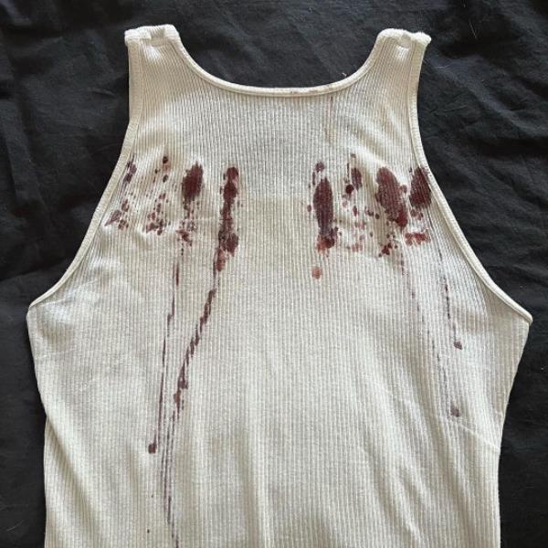 Miguel's bloodied shirt