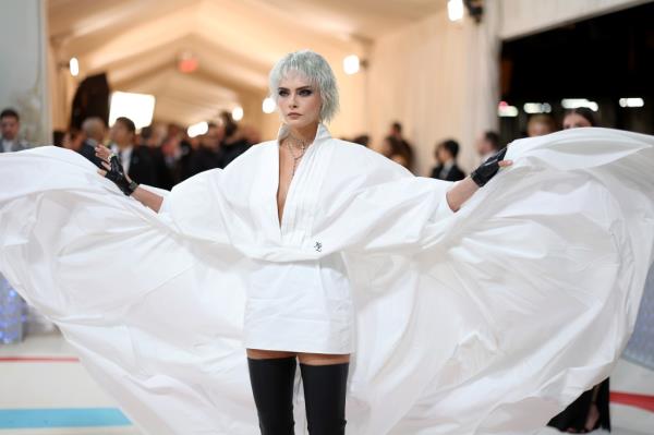 Cara Delevingne at the Met Gala in a white outfit