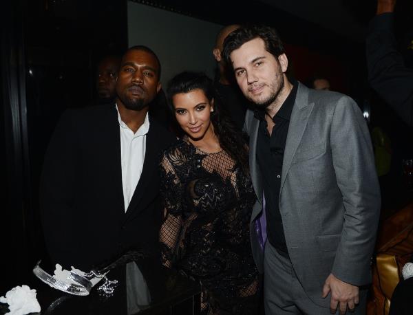 Scott Sartiano, Kim Kardashian, Kanye West in a nightclub