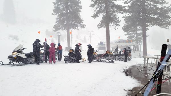 Rescue workers searching at the scene of the avalanche near Lake Tahoe.