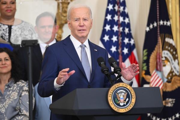 US President Joe Biden speaks during an event to recognize the 2023 WNBA Champions Las Vegas Aces, in the East Room of the White House in Washington, DC on May 9, 2024. 