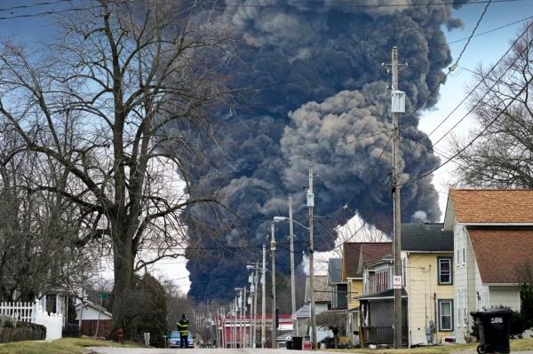 A black plume rises over East Palestine, Ohio, on Feb. 6, 2023.