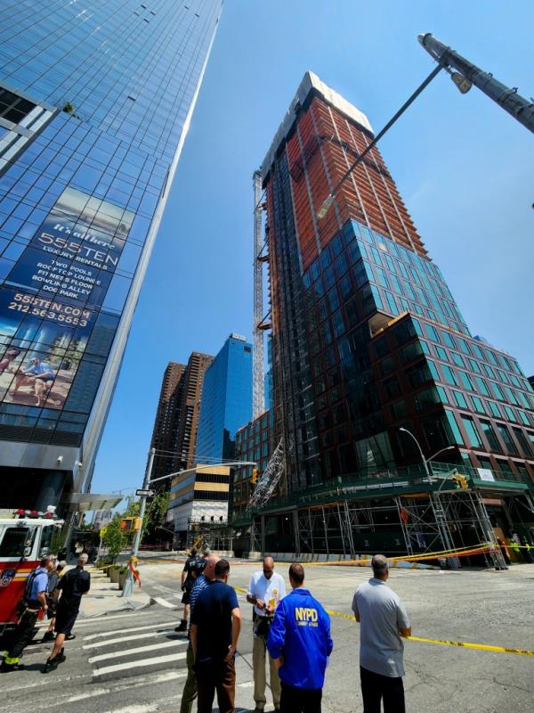 A Manhattan woman says she’s now in debt after a crane flew through her apartment window last week, forcing her out of her home. 