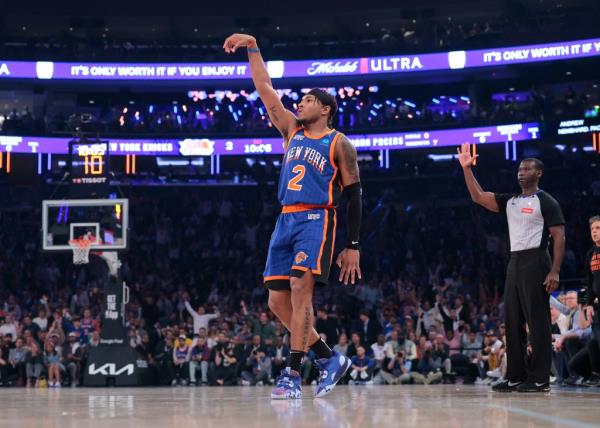 Knicks guard Miles McBride #2 puts up a shot against the Pacers in Game 5.