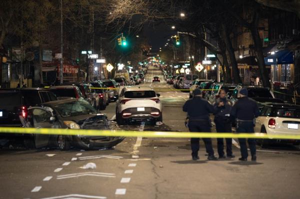 Police are seen at the scene of a fatal two car accident on Irving Ave. and Stockholm St. in Brooklyn, Monday, Jan. 8, 2024.