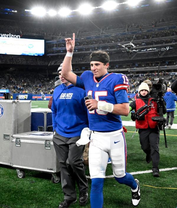 New York Giants quarterback Tommy DeVito (15) puts one finger up as he comes off the field at the end of the fourth quarter. The New York Giants defeat the Green Bay Packers 24-22.