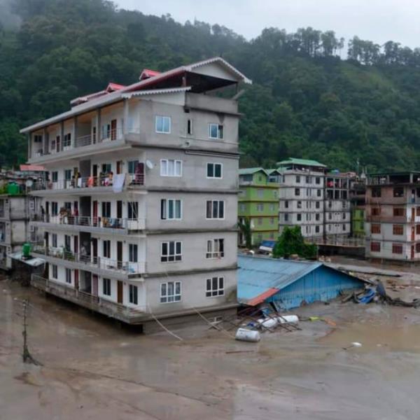 Buildings are inundated after flash floods triggered by a sudden heavy rainfall swamped the Rangpo town in Sikkim, India, Thursday, Oct.5. 2023. The flooding took place along the Teesta River in the Lachen Valley of the north-eastern state, and was worsened when parts of a dam were washed away. (AP Photo/Prakash Adhikari)