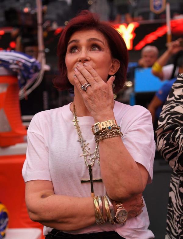 Sharon Osbourne reacts as husband Ozzy performs during half-time of the NFL game between the Los Angeles Rams and the Buffalo Bills.